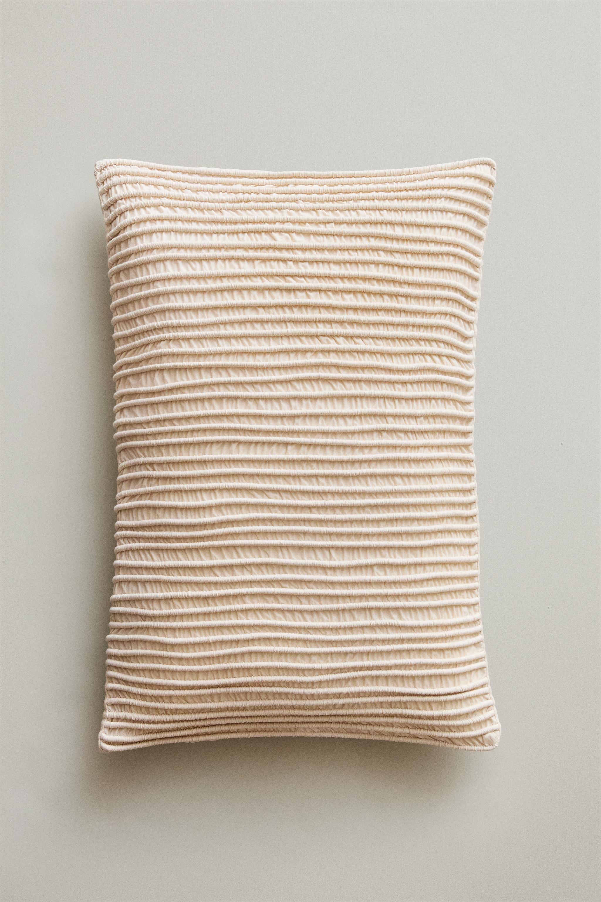 HOUSSE COUSSIN PLISSÉE